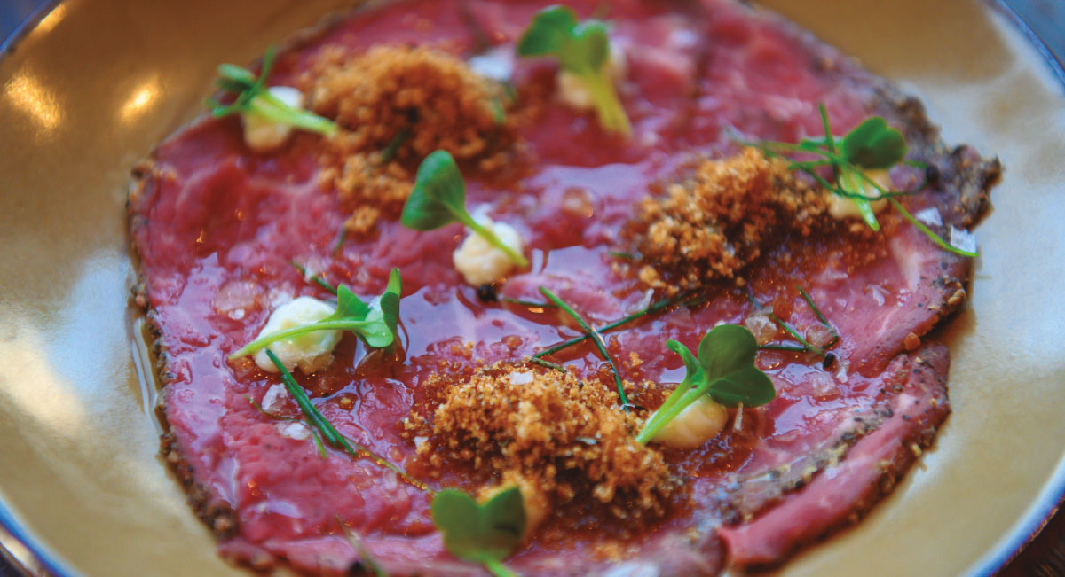 Beef striploin carpaccio with fried bread sand